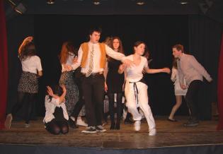 <em>The Domino Effect</em> Article Photo - The Disaster Dance
